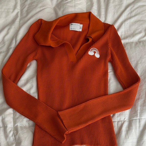 orange ribbed collar v neck with rainbow badge long sleeve - Picture 4 of 5